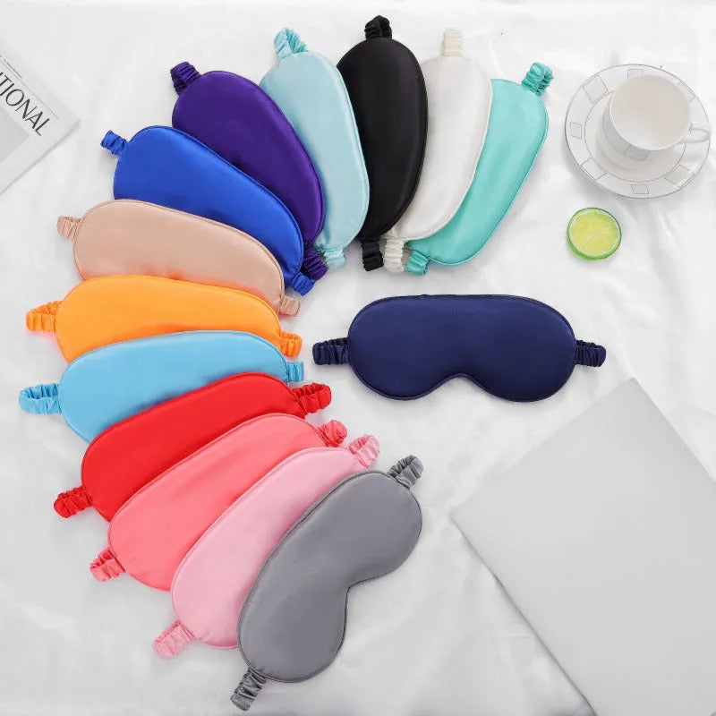 Reversible rayon satin sleep mask in a choice of colours with an elastic headband.