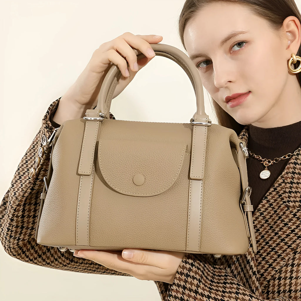 Genuine leather ladies handbag with combination lock and single strap in street trend style