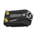 Black Wildfire FPV dual receiver goggles for drone flying, shown on a stand.