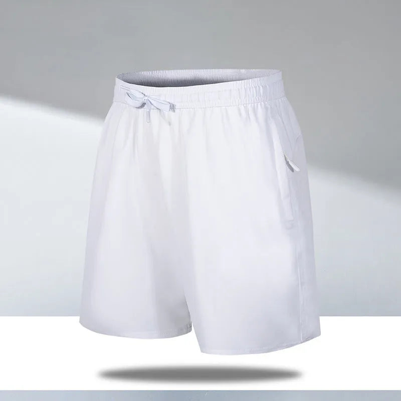 Men's loose fit quick-drying sports shorts in polyester fabric for summer activities