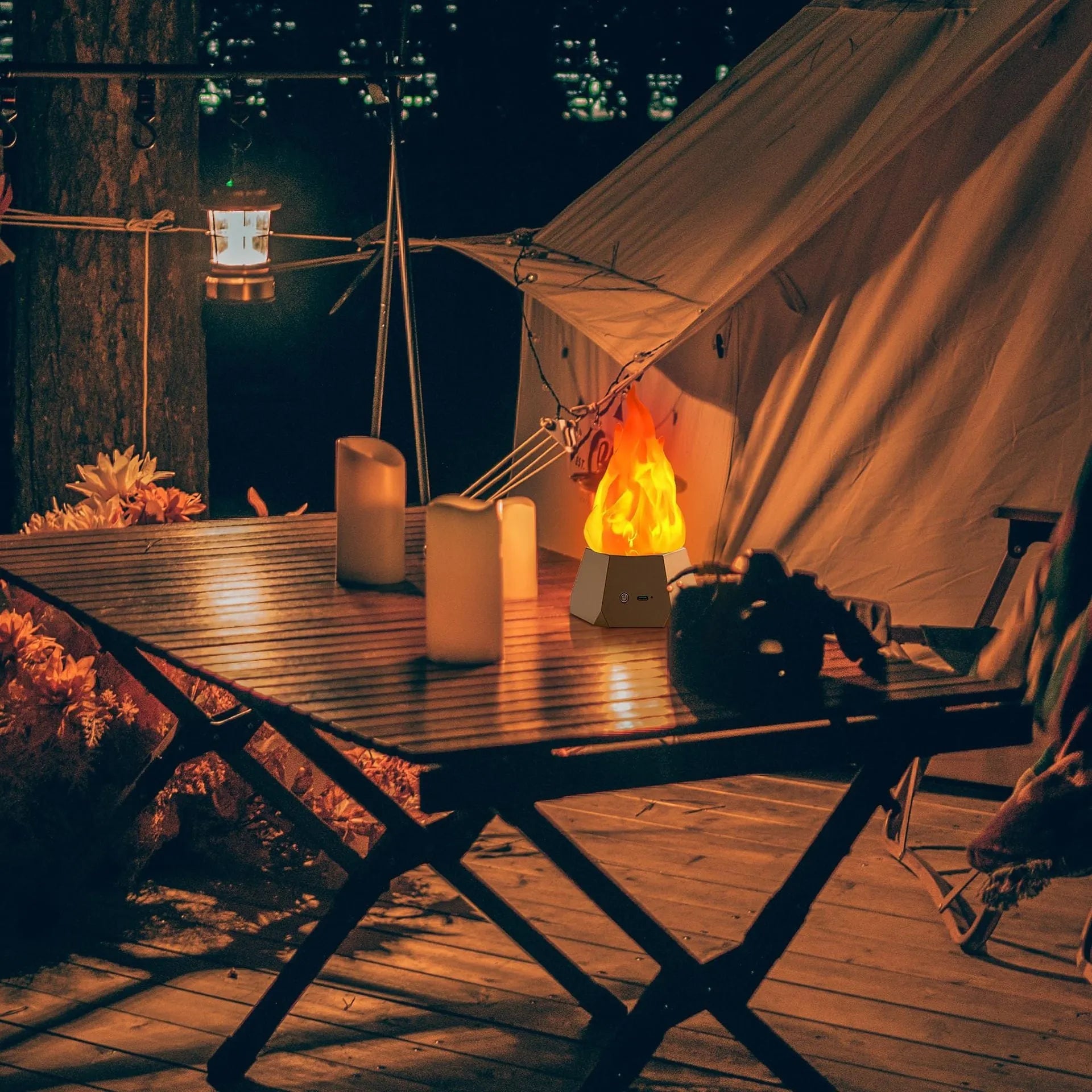 Flame-shaped outdoor decorative lights with black charging base on wooden surface