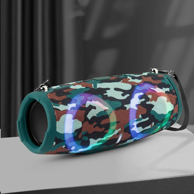 War Drum portable Bluetooth speaker with RGB lights in camouflage colour with carrying strap.