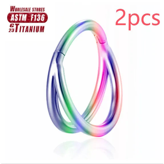 Titanium alloy nose ring in silver, available in plain or diamond-set styles and multiple lengths.