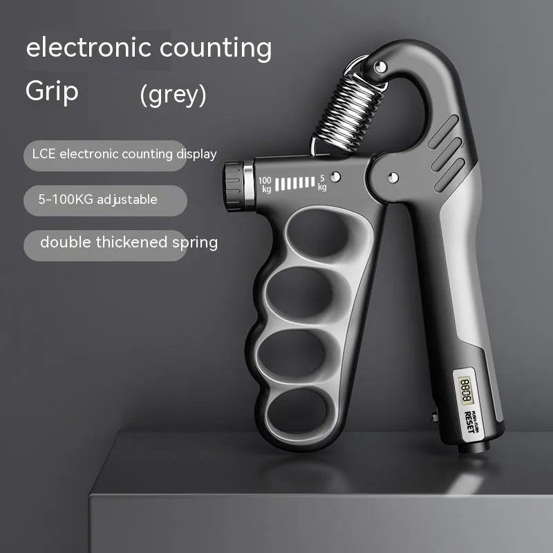 Orange electronic counter spring grip for hand strength training on a grey background.