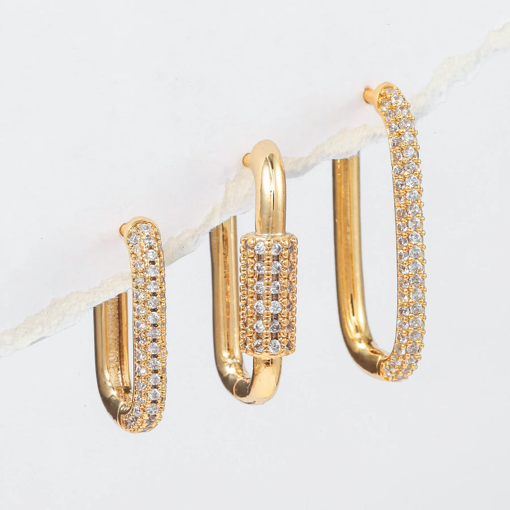 Three geometric copper ear clips with micro inlaid zircon treatment in gold and white colours