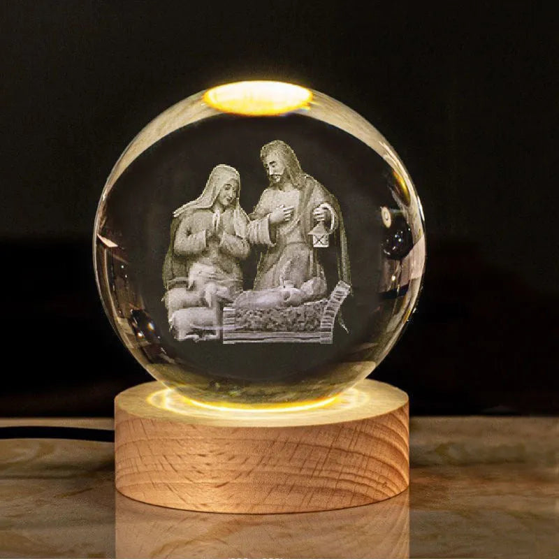 White crystal ball with cross and religious symbols on wooden LED base desk ornament