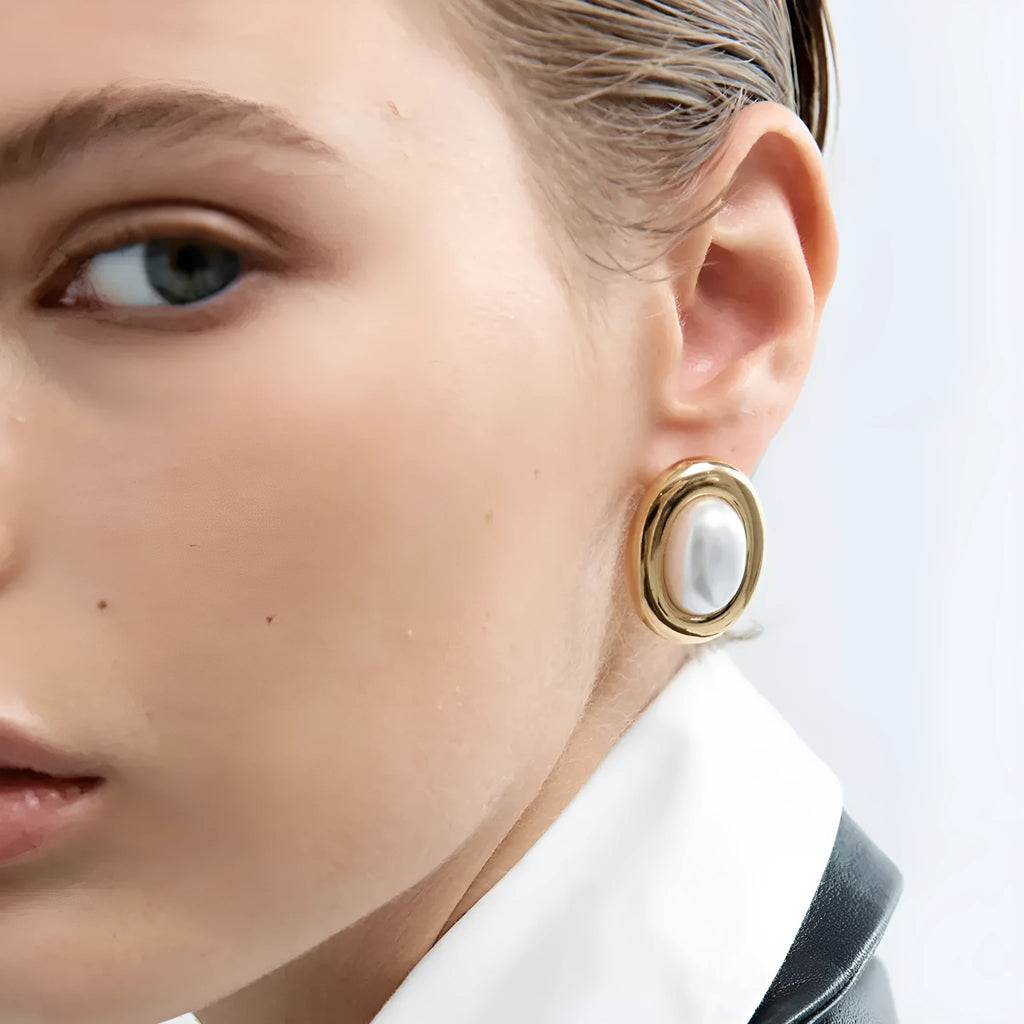 Silver vintage pearl stud earrings made from stainless steel with electroplated finish