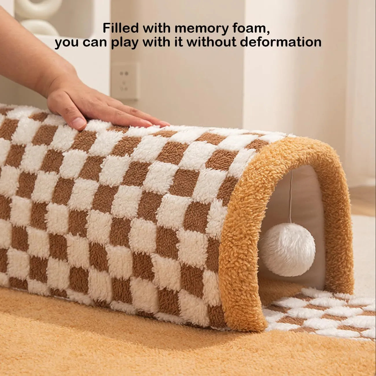 Fan-shaped plush pet bed with integrated tunnel for cats and small dogs in a plaid pattern.