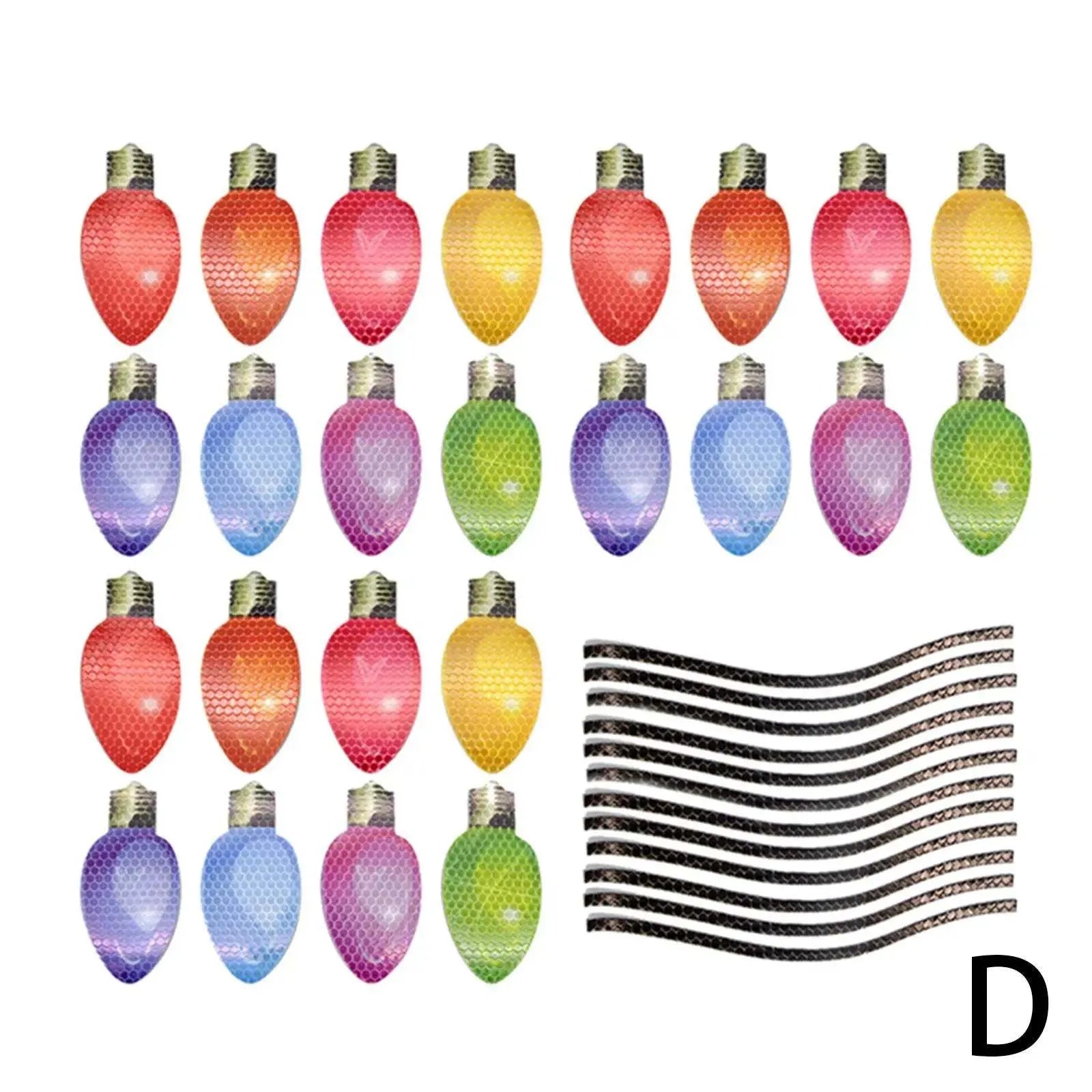 Set of magnetic reflective Christmas light bulb and wire stickers on a metal surface.