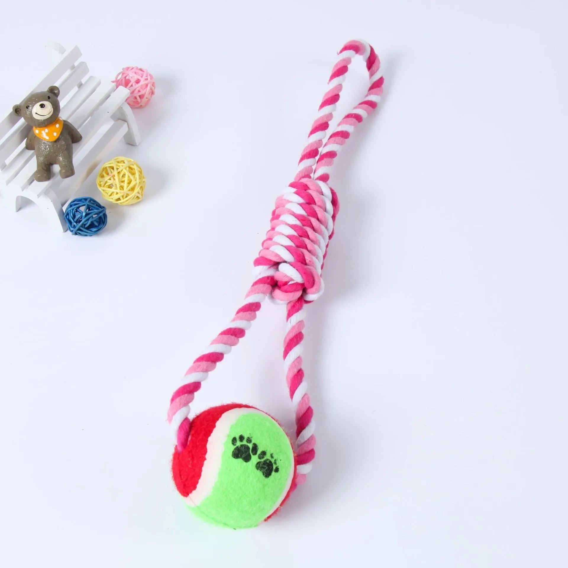 Red and white cotton string dog toy with ventilation holes, measuring approximately 38cm in length