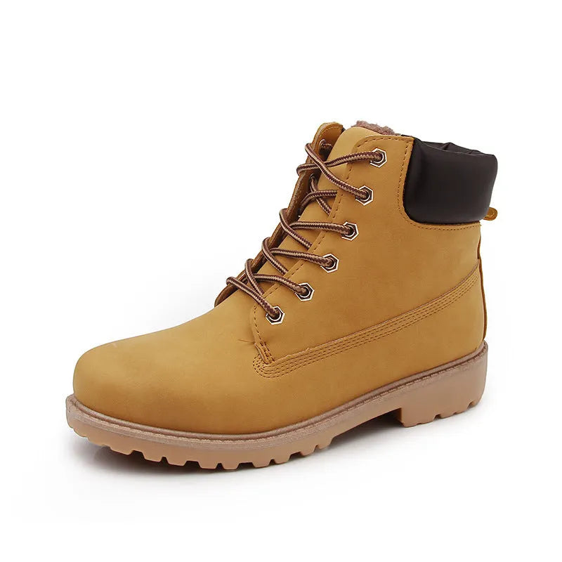 Men's pink Martin ankle boots with velvet lining, round toe, flat sole, and front lace-up closure.