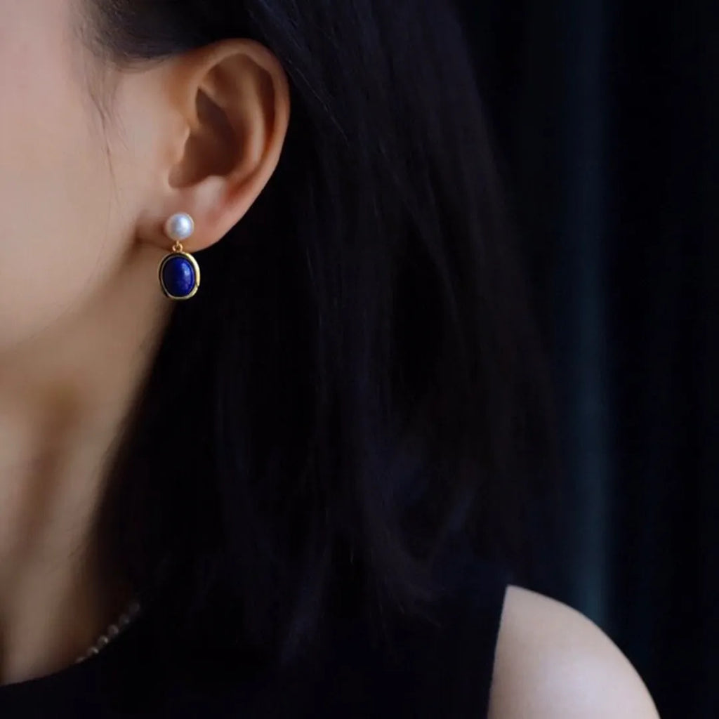 Lapis lazuli pearl drop earrings in sterling silver with auspicious pattern detailing