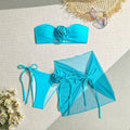 Women's pink swimsuit tube top with three-dimensional flower tie design and matching skirt