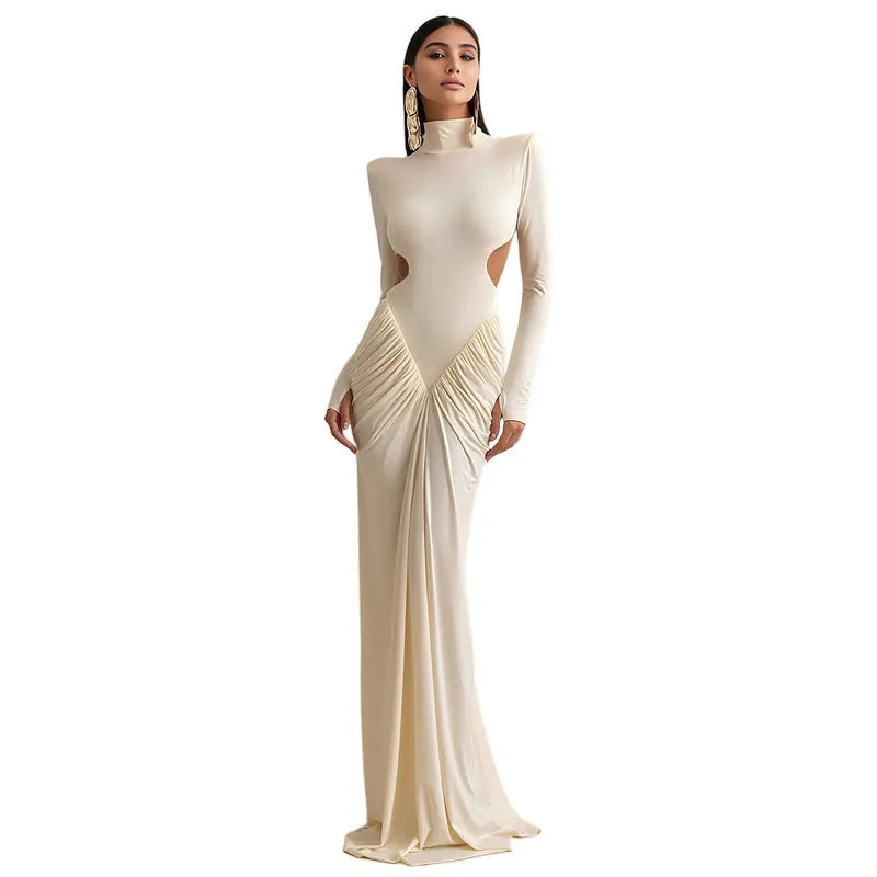Long sleeve high collar slim fit dress with pleated backless detail in a solid colour