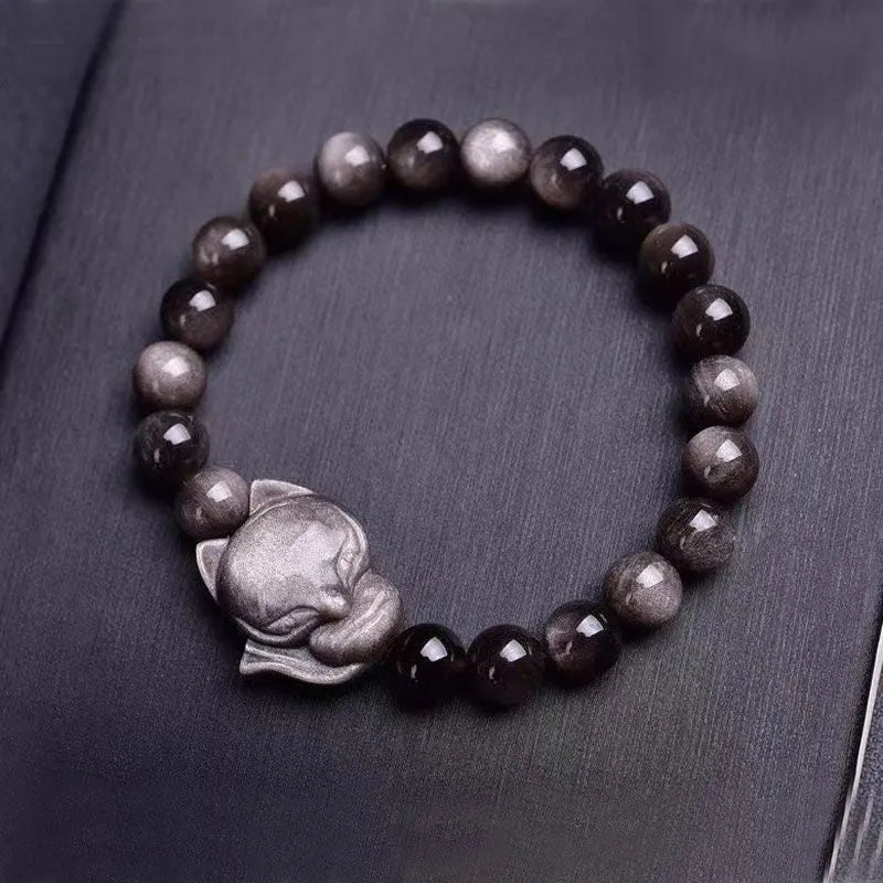Obsidian fox charm bracelet with adjustable leather cord and sliding knot closure