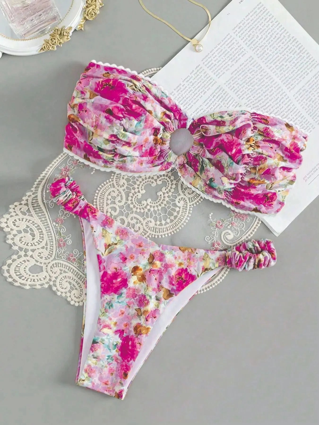 Women's floral printed bikini set with lace-up tube top and coordinating shorts for swimming