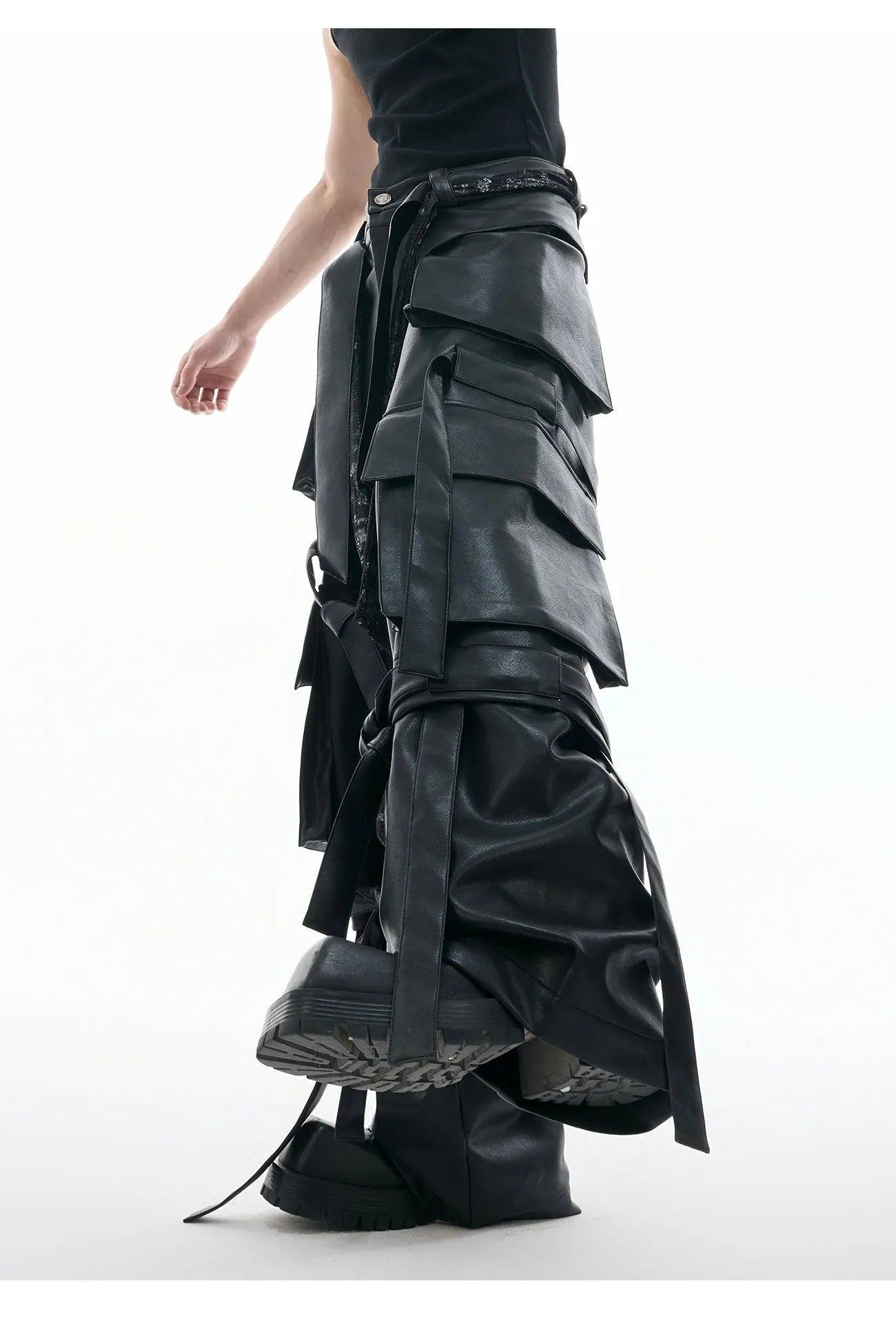 Men's black loose-fit quilted trousers with multiple pockets and heavy stitching