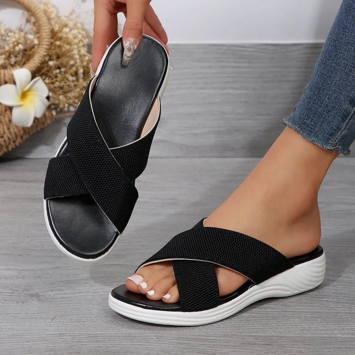 Women's black peep toe wedge slippers with a fish mouth design and thick rubber sole.