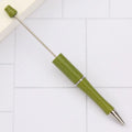 Ballpoint pen with colourful rotating plastic beads on steel wire barrel showing gradient colour options