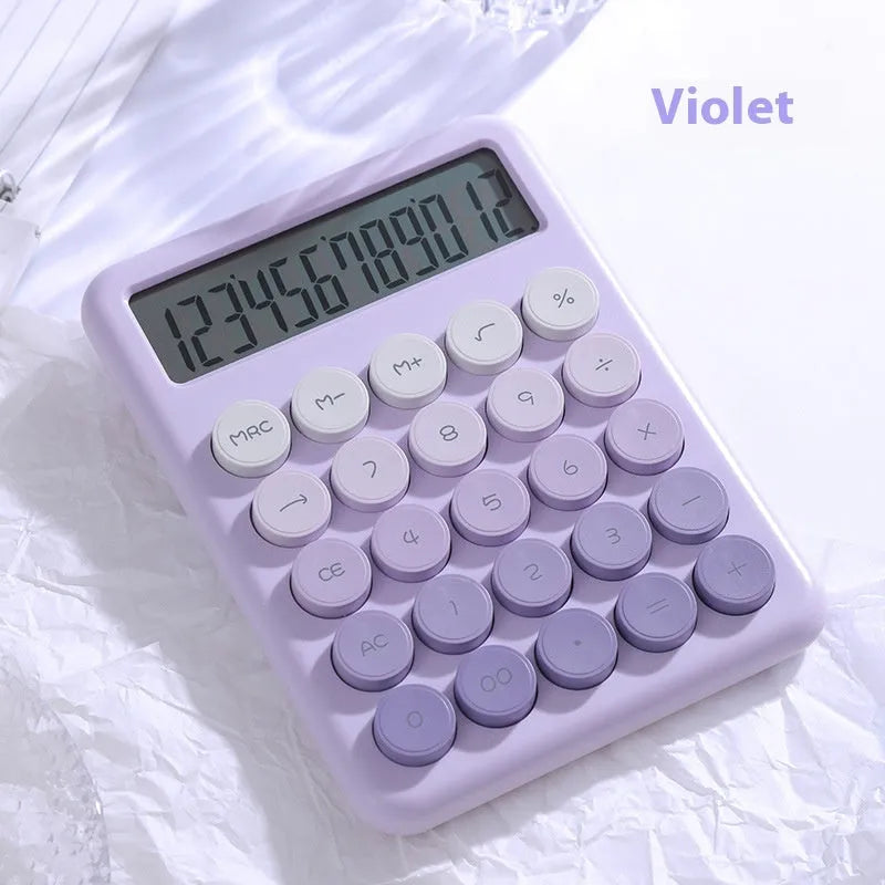 Dopamine gradient colour desk calculator in violet, pink, blue, and green options on a desk