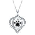 Silver tone dog and cat paw print necklace with cross chain design