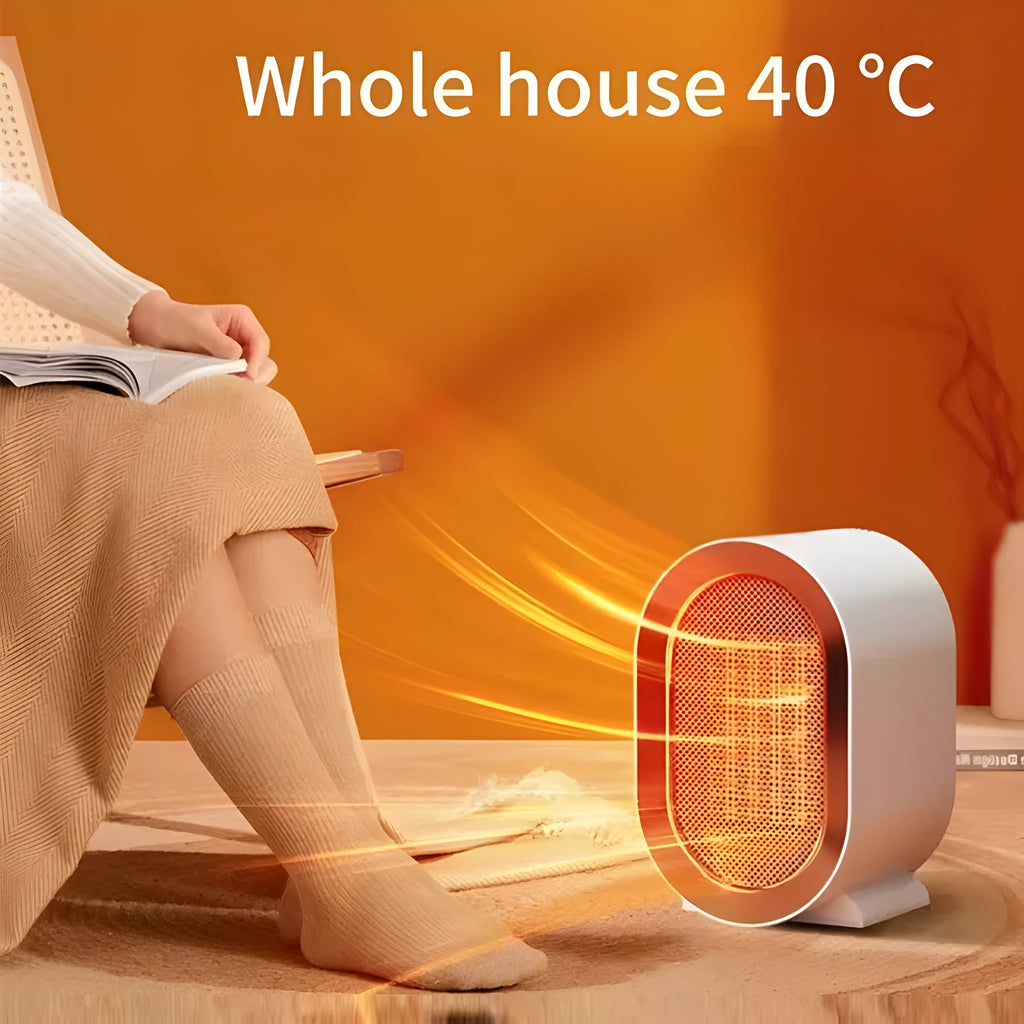 Black desktop electric fan heater with mechanical dial controls and ceramic heating technology