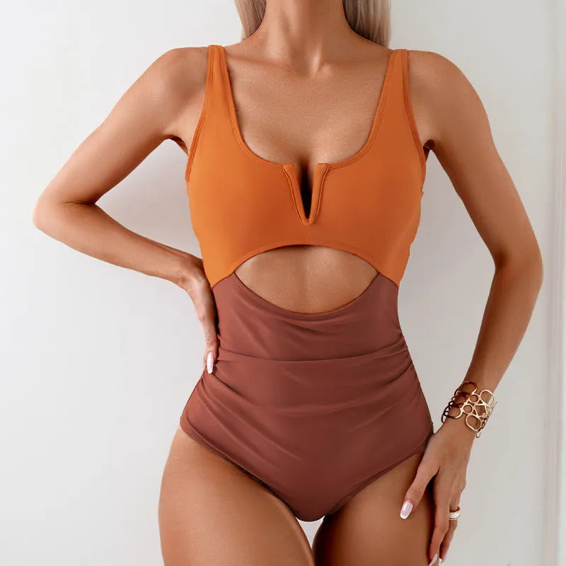 Women's colour block one-piece swimsuit in nylon fabric showing contrast colour design