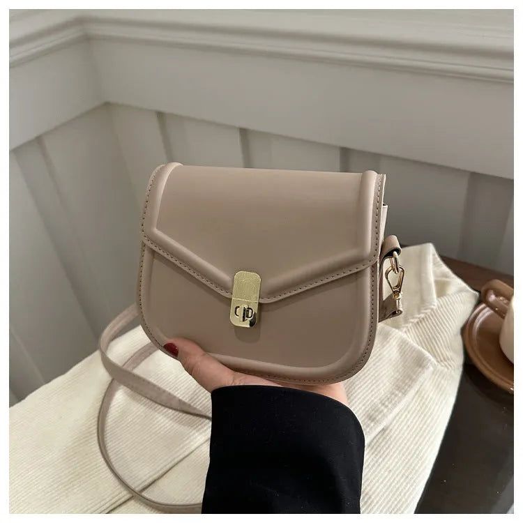 Niche textured PU shoulder messenger bag in soft horizontal square clamshell design