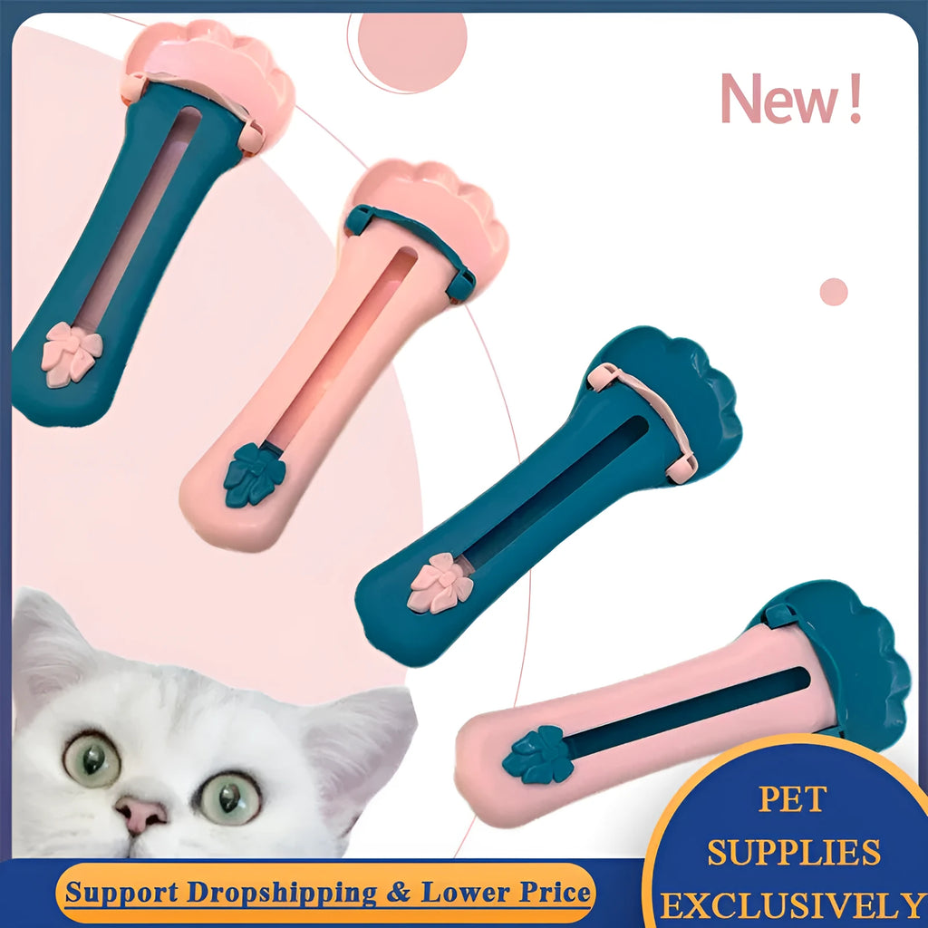 Green and pink plastic pet food scoop with squeeze mechanism for dispensing treats and liquid food
