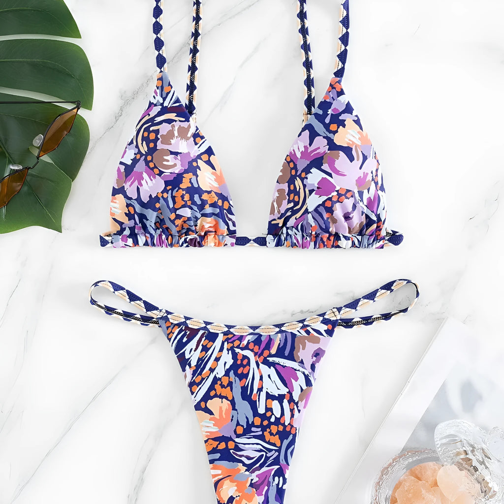 Women's floral printed polyester swimsuit with triangle bag design and briefs style bottom in S, M, L sizes