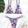Women's floral printed polyester swimsuit with triangle bag design and briefs style bottom in S, M, L sizes