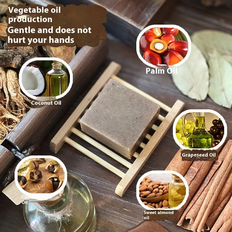A single 72g round bar of nine herbs cold process shampoo soap on a wooden surface.