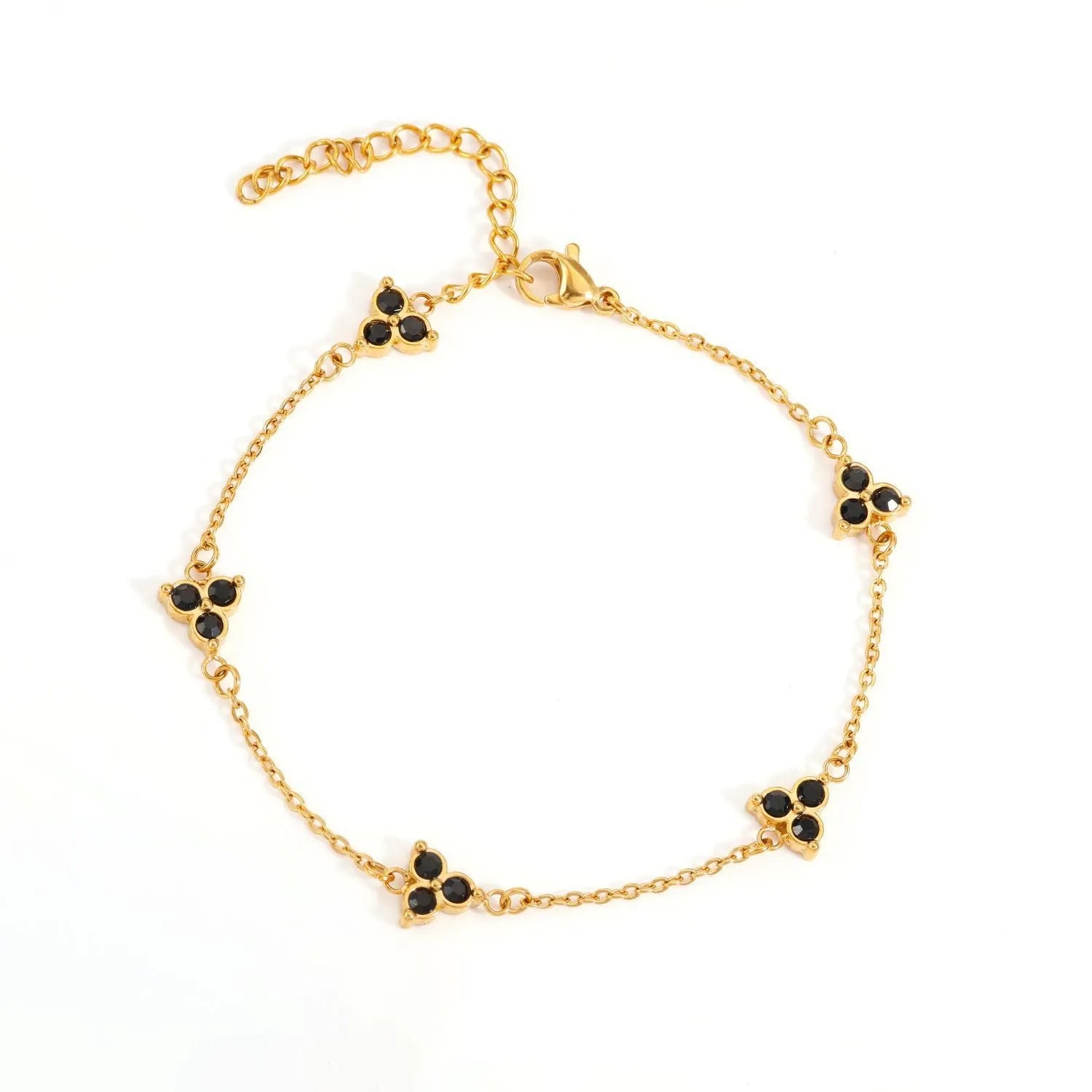 Stainless steel women's bracelet with three triangular diamond motifs set with colourful zircon stones.