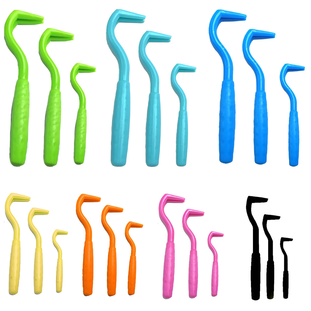 Set of three pet tick removal hooks in various colours for dogs