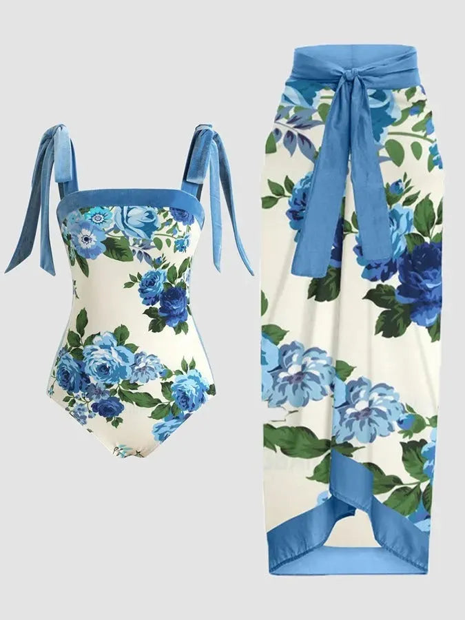 Women's printed floral two-piece swimsuit with a matching chiffon hip skirt.