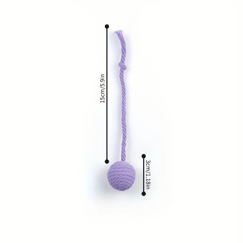 Coloured cat toy ball with rope attached and built-in bell inside, shown in green, pink, purple, and yellow options