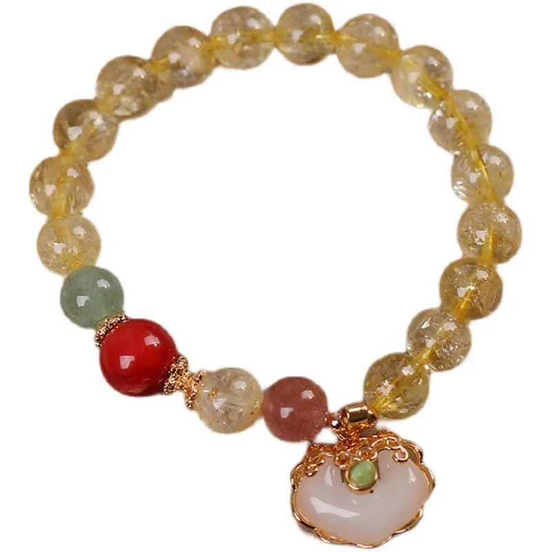 Original design women's alloy bracelet with a natural yellow hair crystal citrine jade ruyi pendant charm.