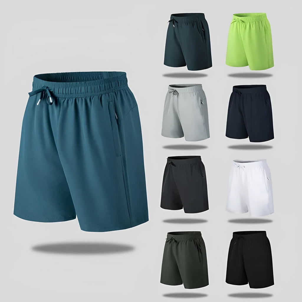 Men's loose fit quick-drying sports shorts in polyester fabric for summer activities