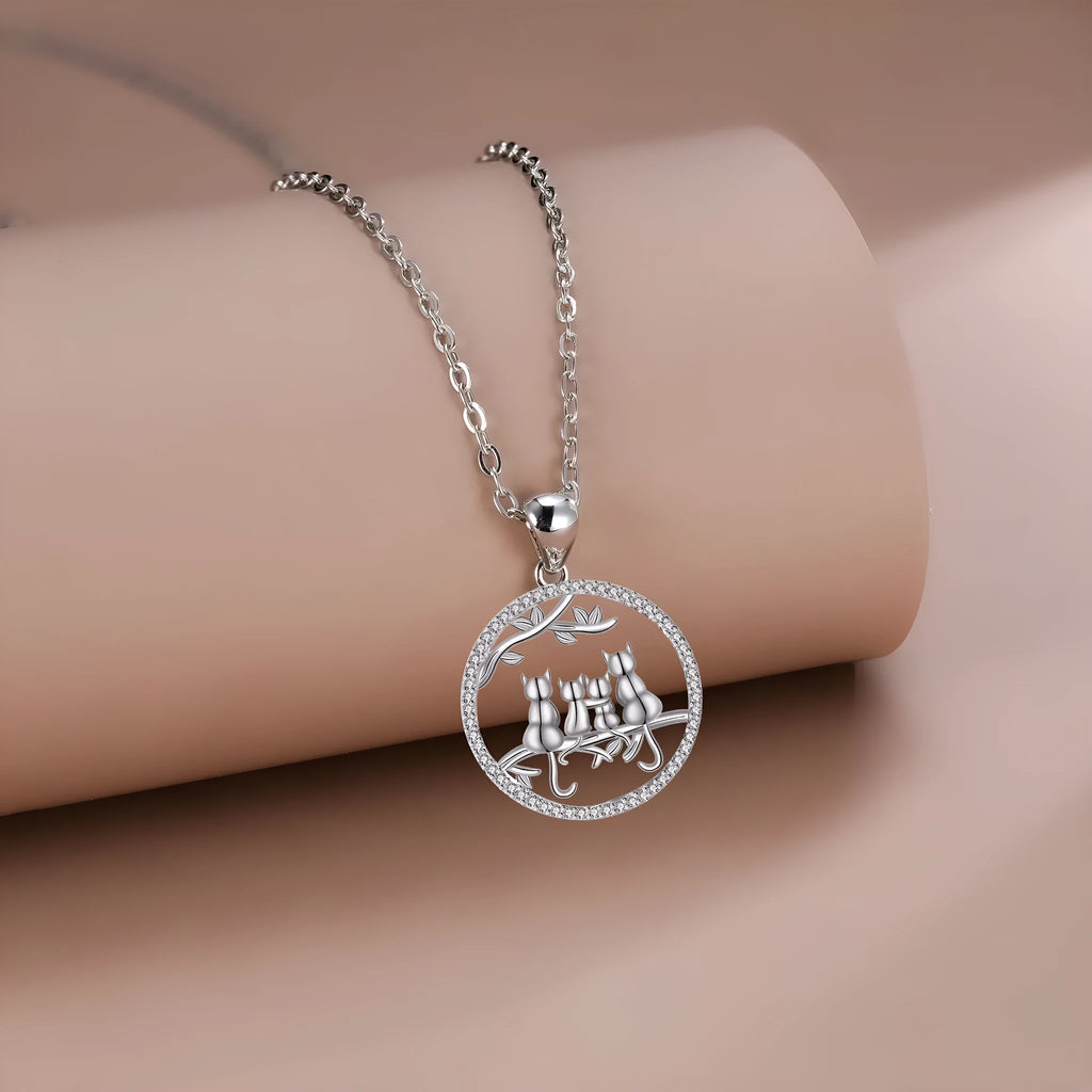 Women's necklace with four kitten pendant on copper cross chain, electroplated finish