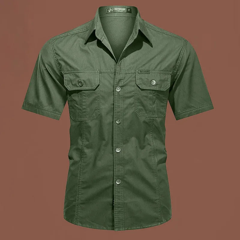 Men's loose-fitting short sleeve cotton work shirt in army green, laid flat.