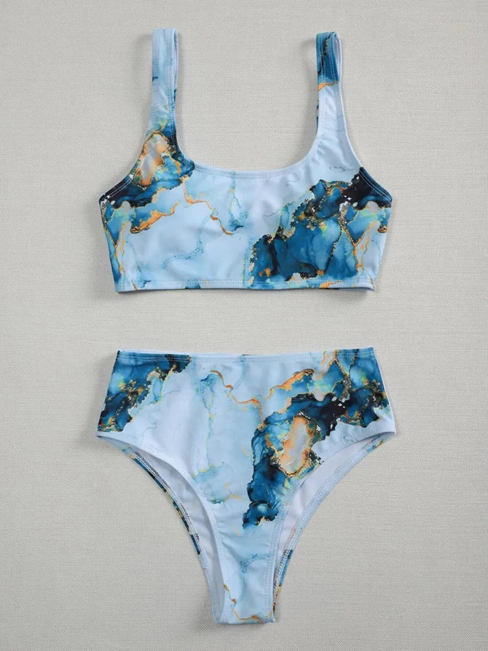Women's high-waist marble tie-dye print bikini set with U-neck top.