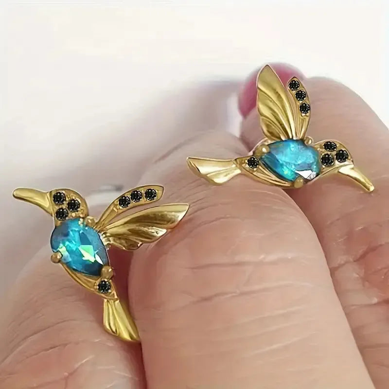 Bird hanging earrings with mixed zirconium wings in long style design on alloy background