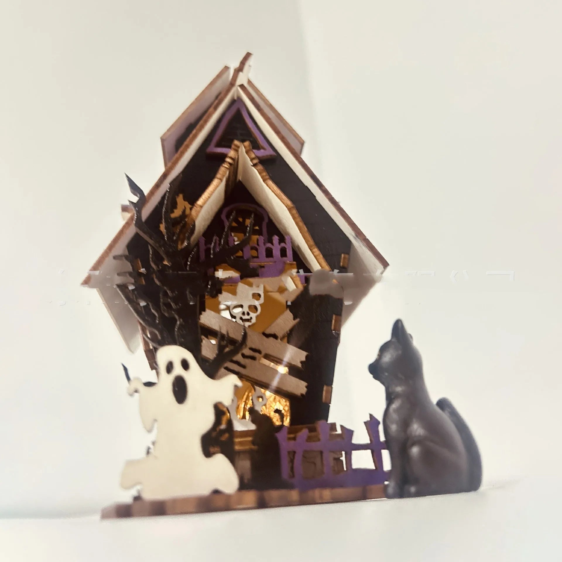 Wooden Halloween haunted house decoration with luminous paint finish, measuring 14x10.5x19cm