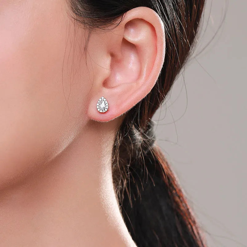 Silver water drop shaped ear studs with diamond treatment surface texture