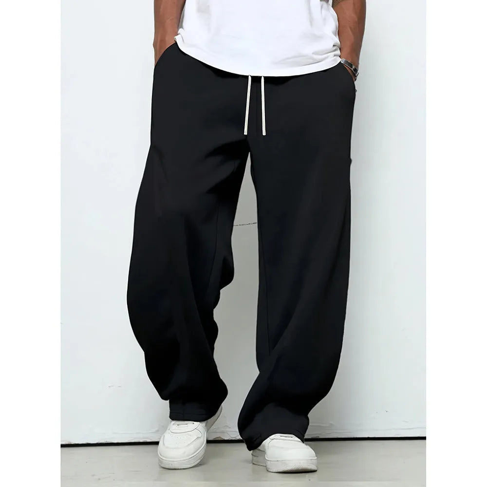 Men's straight leg casual trousers in black colour with elastic waistband and drawstring closure