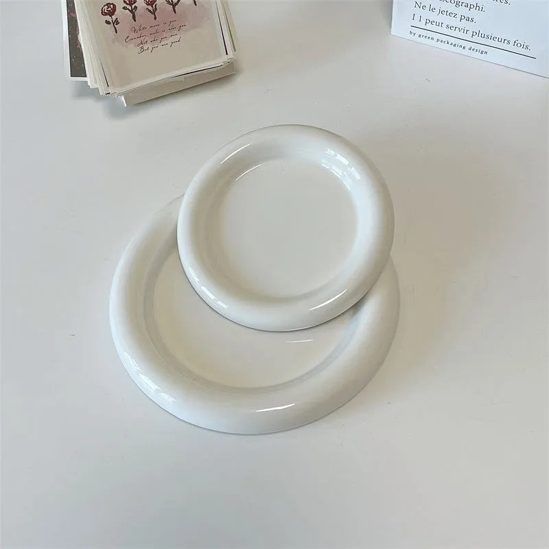 White porcelain chubby toot plate with bear doodle design, suitable for microwave use
