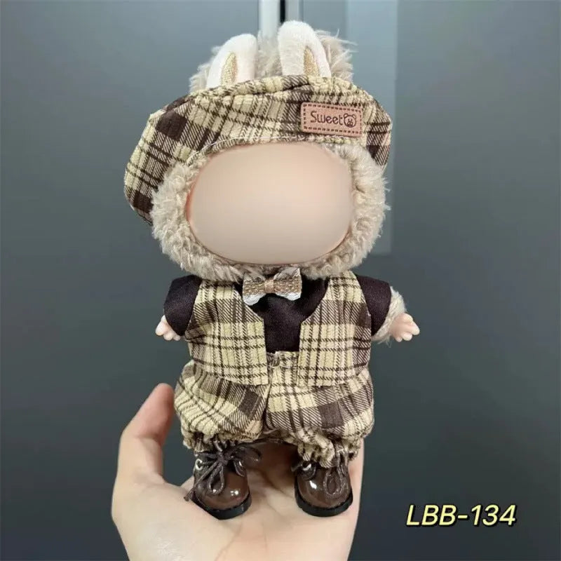 A plastic doll costume outfit for a 17cm tall vinyl figurine on a white background.