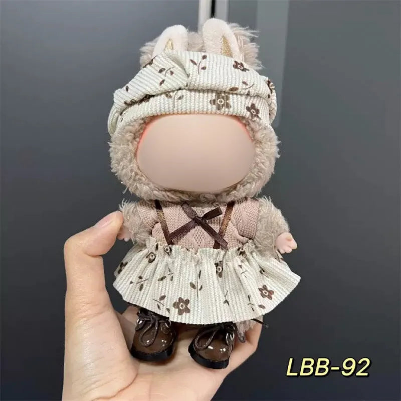 A plastic doll costume outfit for a 17cm tall vinyl figurine on a white background.