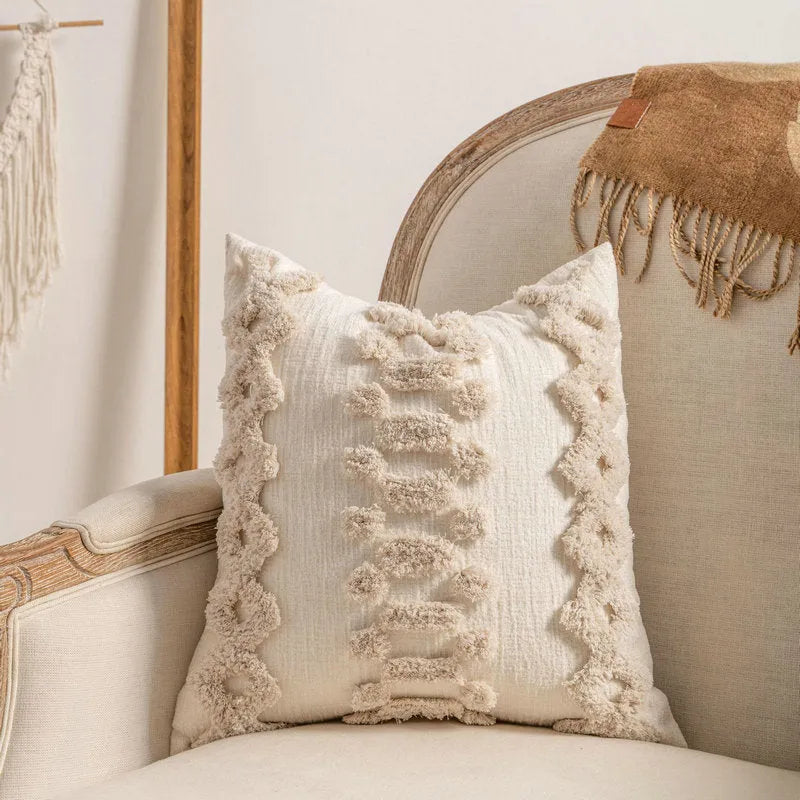 Decorative knitted sofa cushion cover with tassel trim in a choice of six patterns and two sizes.
