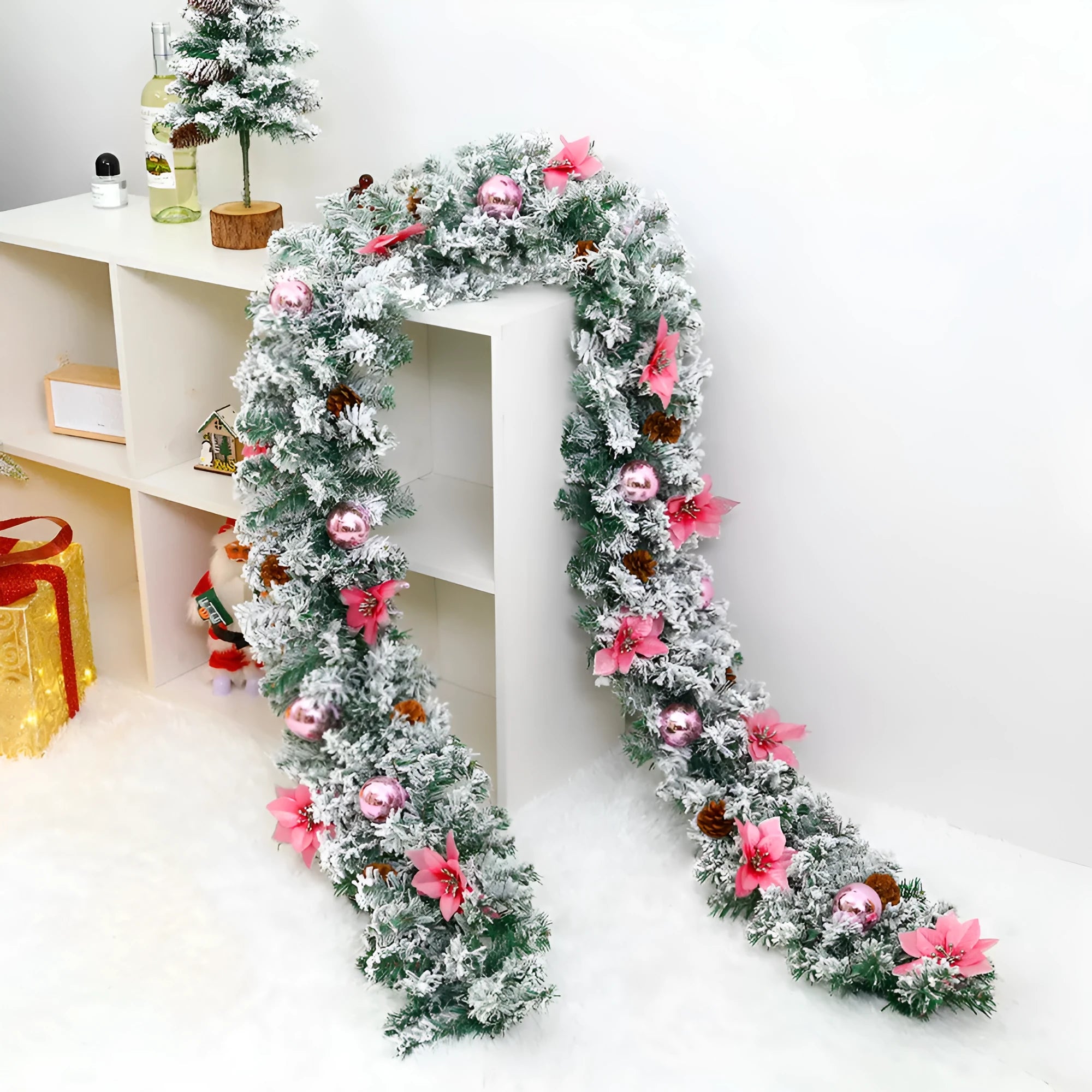 PVC Christmas rattan garland with flocking in golden colour, draped decoratively.